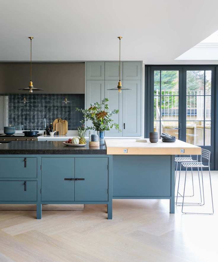 blue country kitchen diner with breakfast bar on blue island