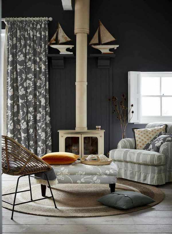 Black living room with curtains by Vanessa Arbuthnott