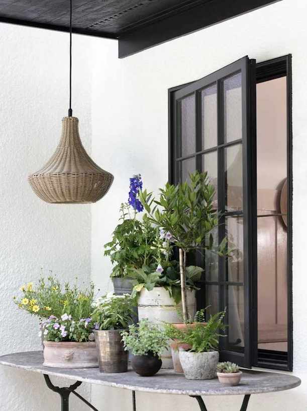 pendant light over container garden