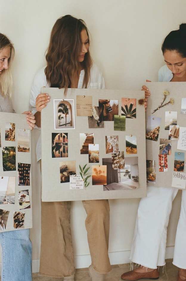 Group sharing their finished vision boards at the end of the party
