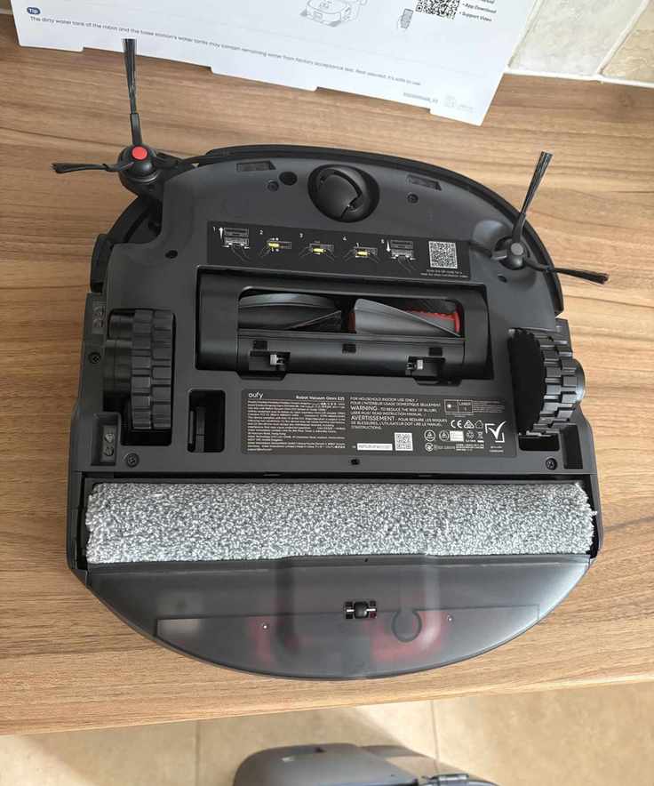 eufy Omni E25 mop brush head, seen here due the robot being turned upside down for visibility