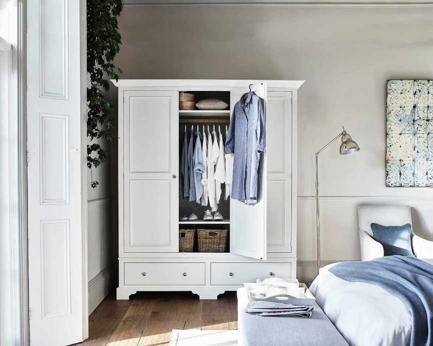 White wardrobe with baskets