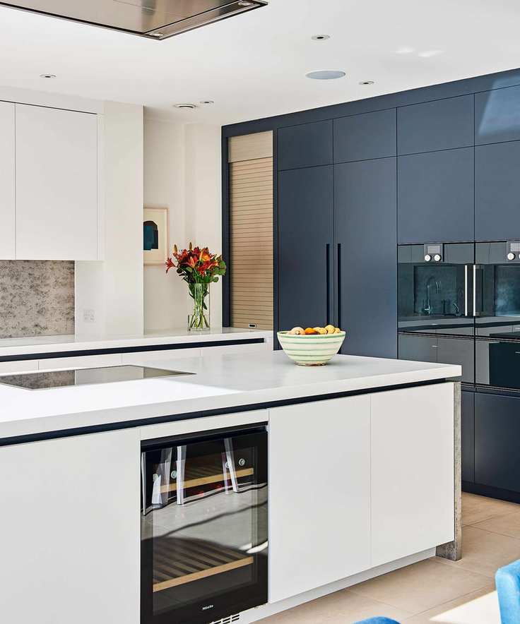 blue kitchen with white island