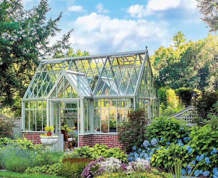 Traditional greenhouse with brick base
