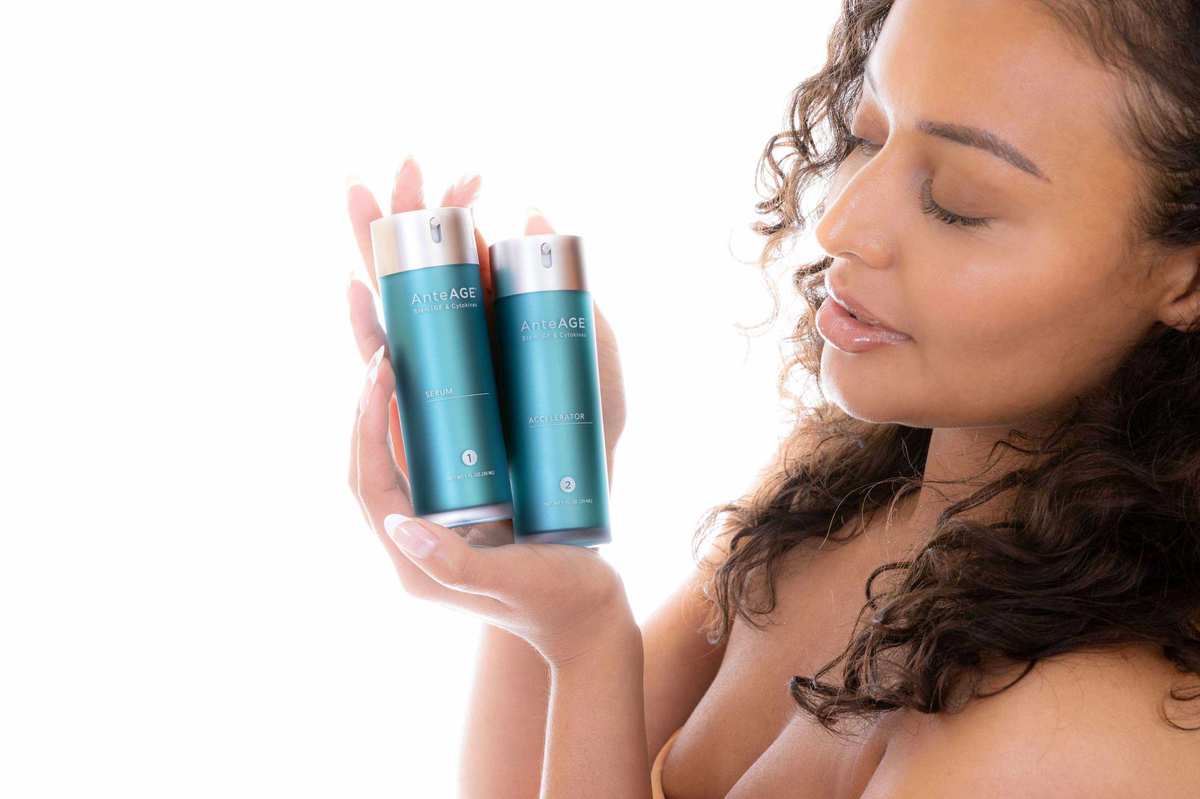 Woman holding anteage products