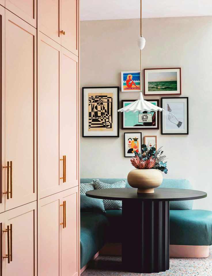 Breakfast room with small round table and banquette seating