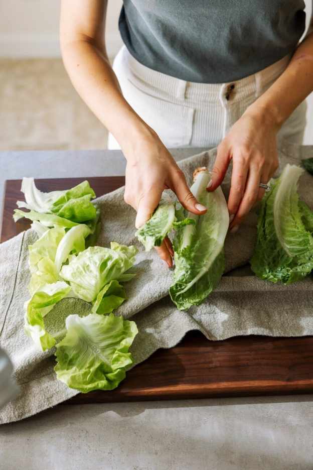 washing lettuce for meal prep