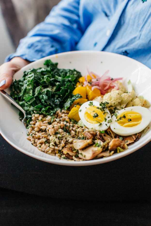 warm farro bowl with roasted cauliflower and kale