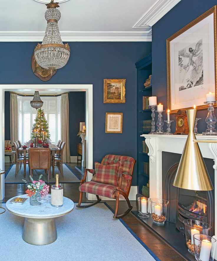 Small crystal empire chandelier in a traditional blue living room