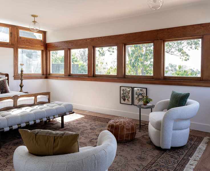 Traditional-style bedroom with cozy seating
