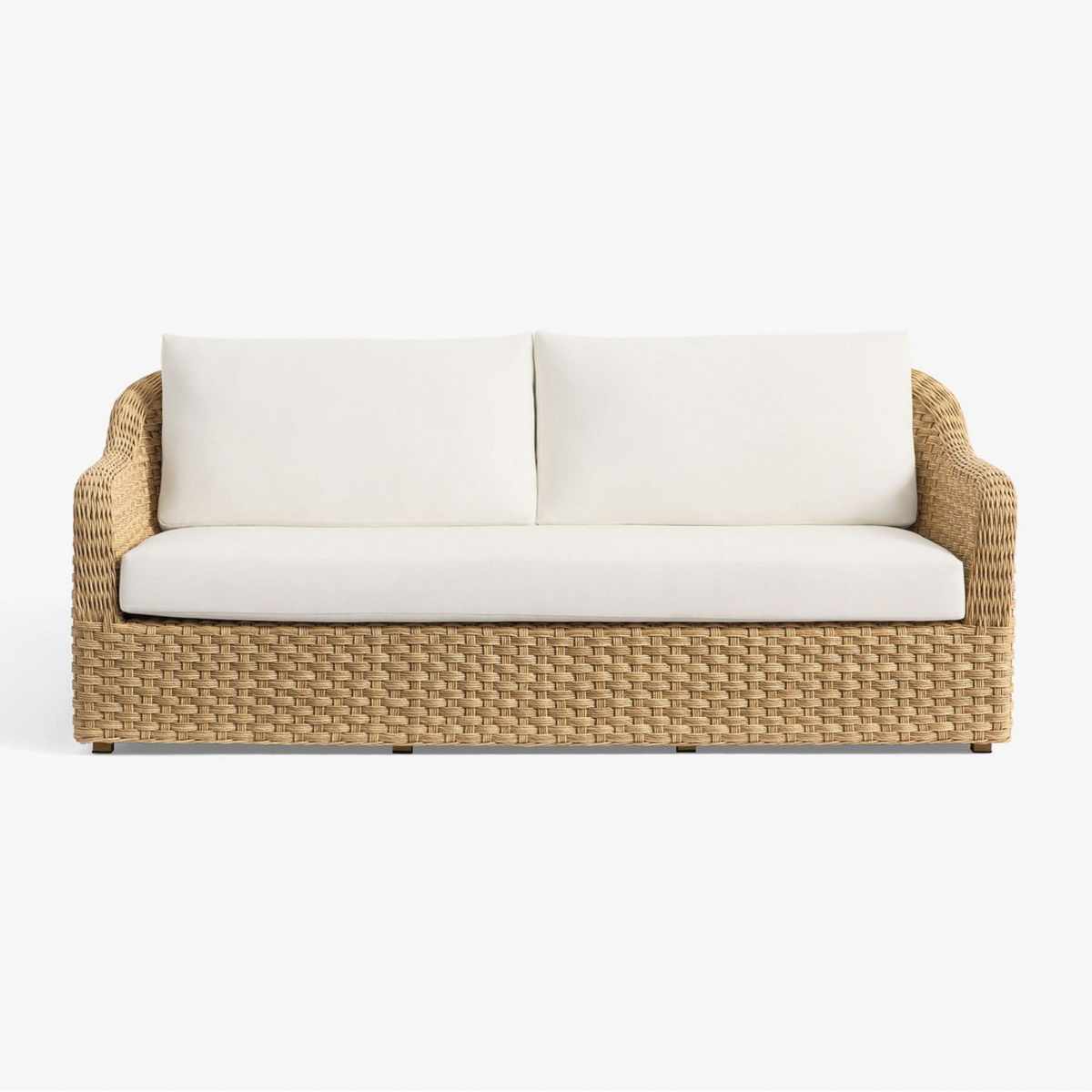 Rattan two-seater outdoor sofa with white cushions