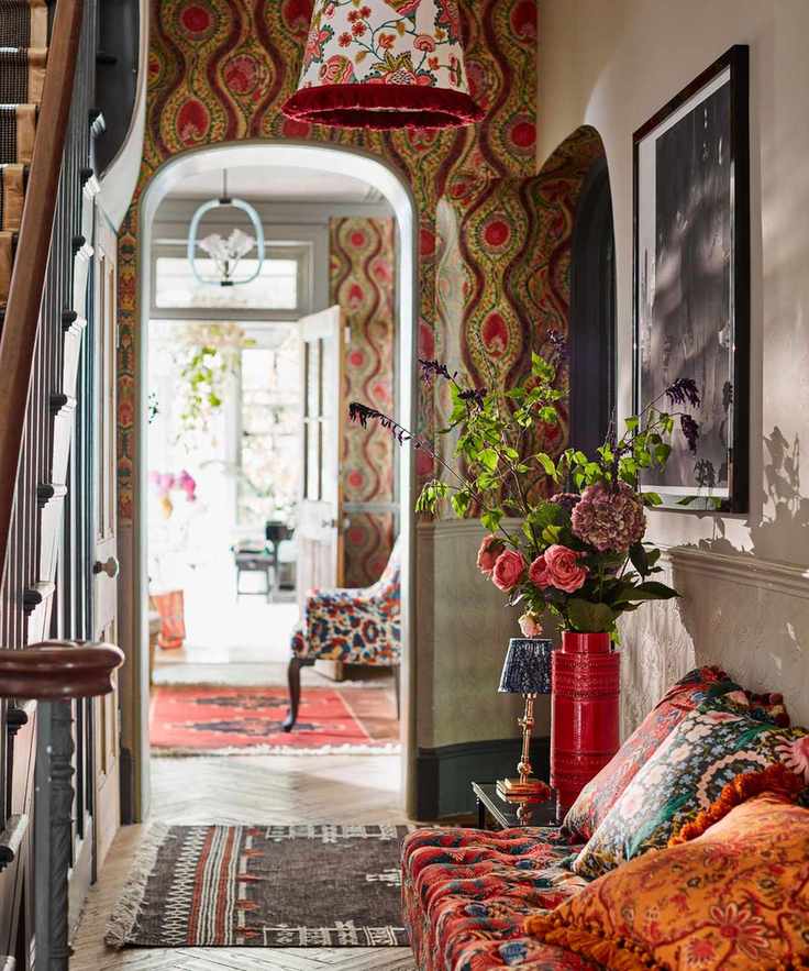 Eclectic hallway with colorful patterns and decor