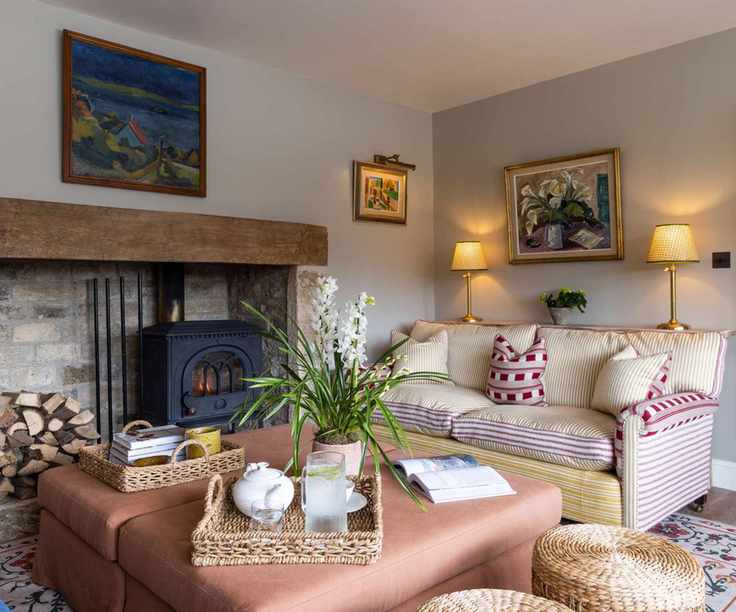 Living room with mismatched furniture in striking colors and patterns