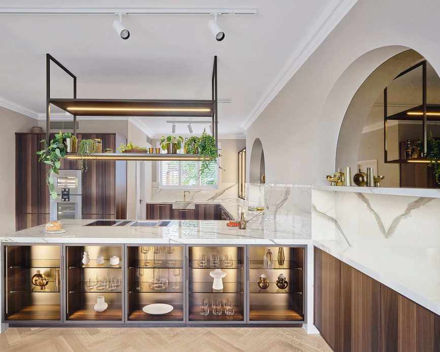 Modern kitchen with above island storage unit