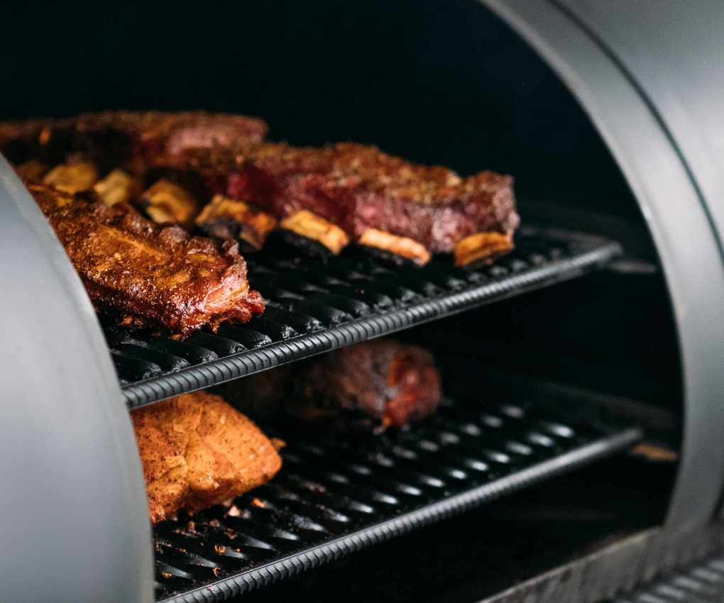 Smoking ribs in a smoker