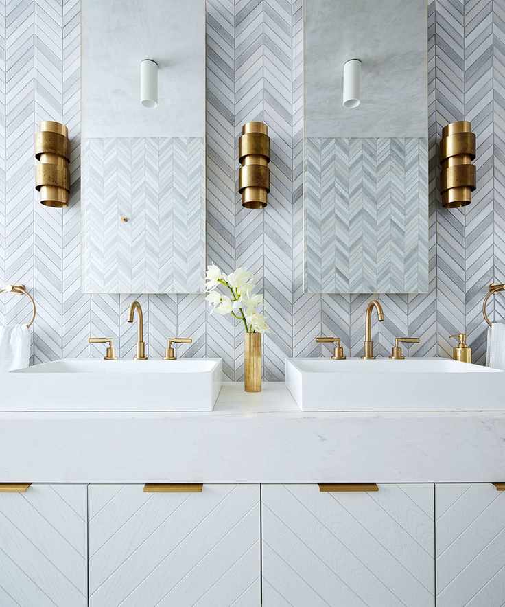 Timeless white bathroom with brass fixtures