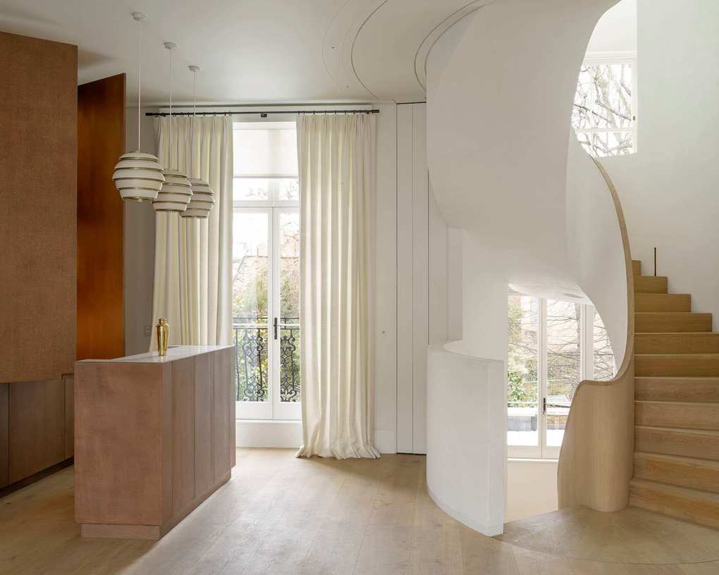 Modern kitchen design with white walls and wooden accents