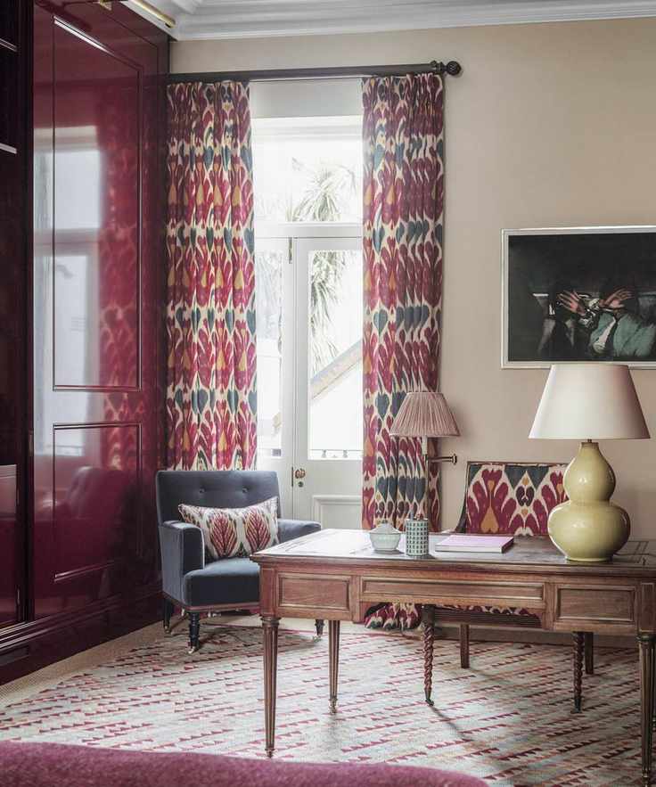 Burgundy home office with high gloss cabinets