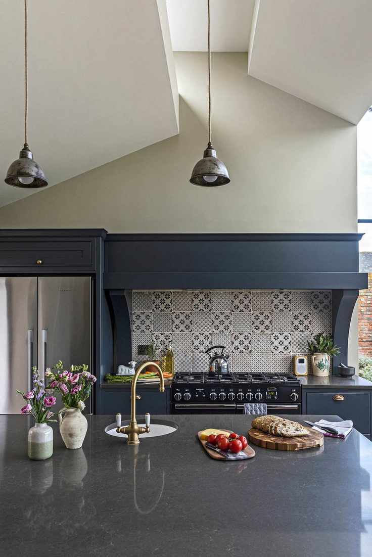 granite countertop in gray kitchen with white walls