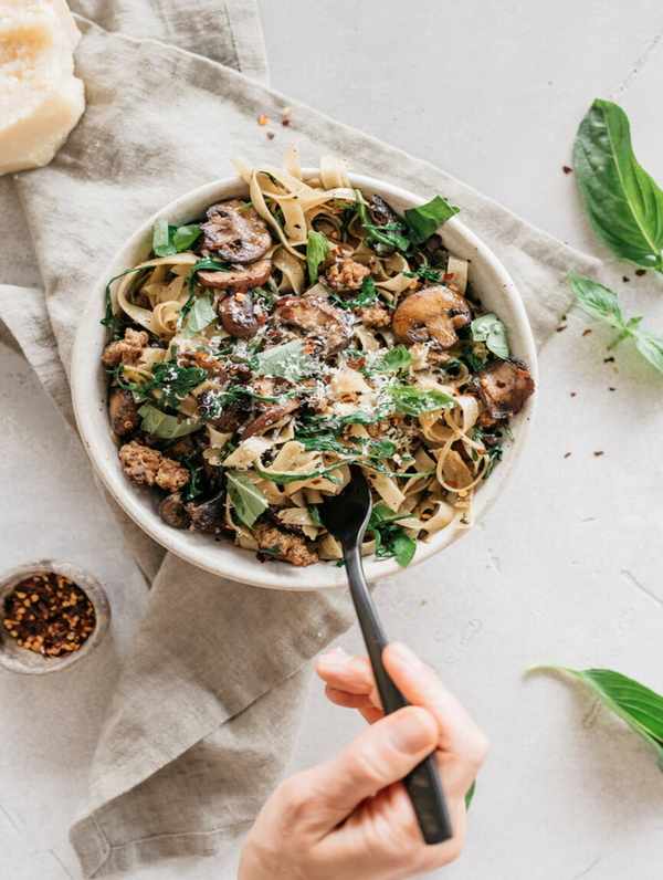 one pot sausage pasta recipe with mushrooms, and arugula