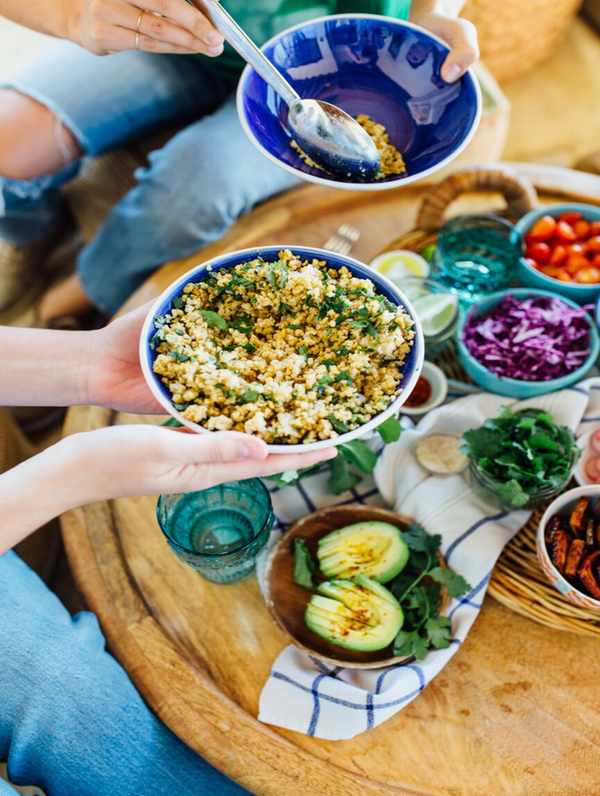 colorful grain bowl potluck dinner party