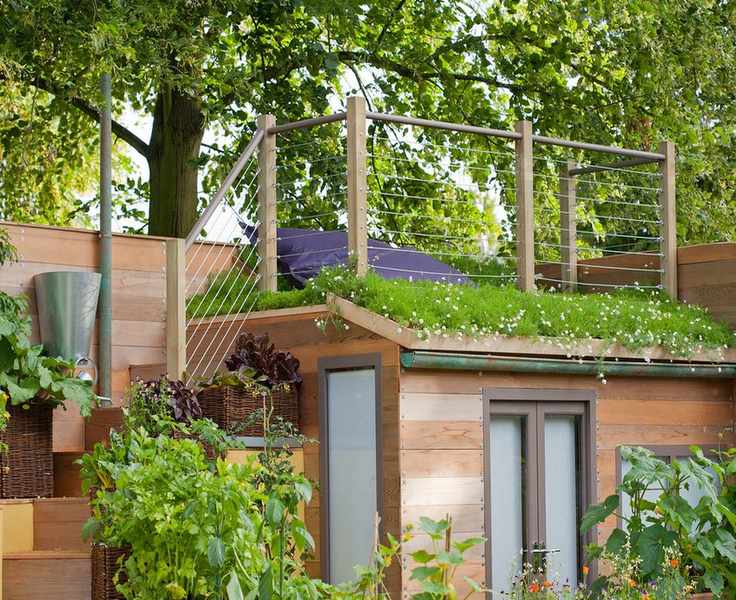 Raised sitting area above the garden shed