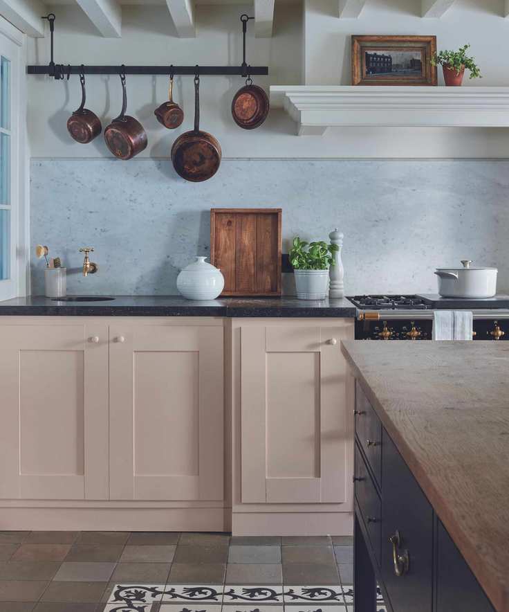 Country kitchen painted in a soft pink hue