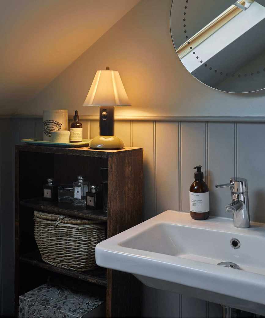 modern bathroom with antique storage
