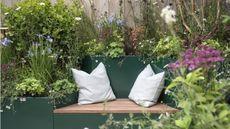 RHS Chelsea Flower Show 2026 bench with layered planting all around
