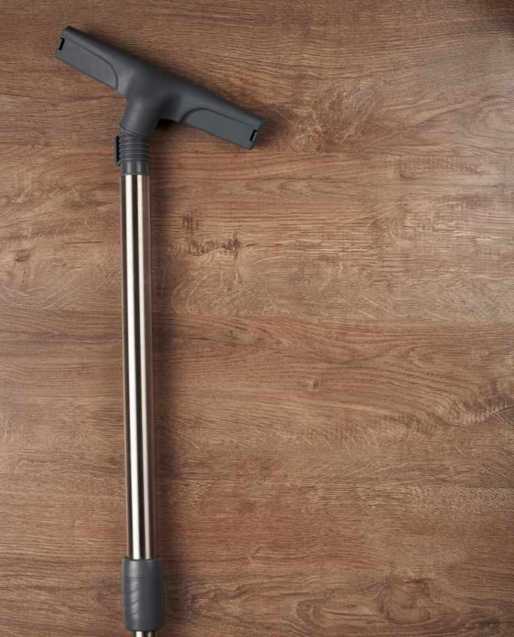 Vacuum cleaner on wood floor