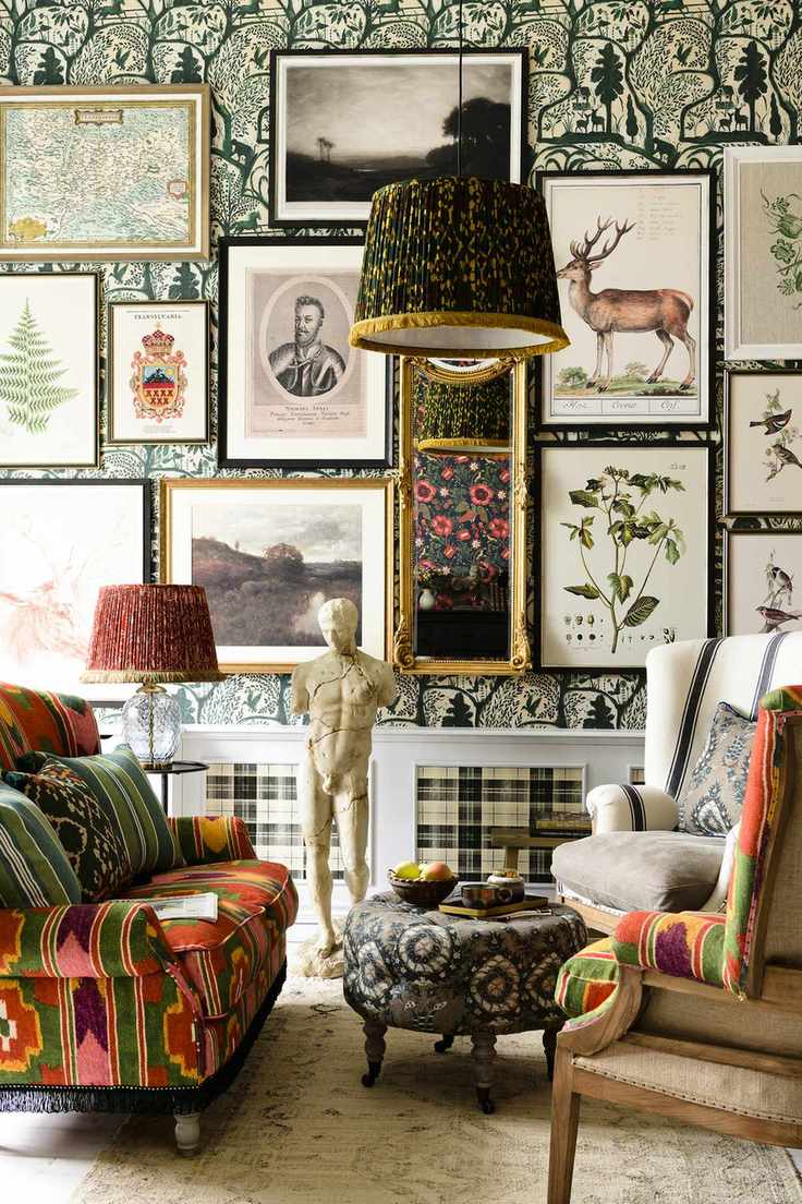 a gallery wall in a colourful living room by mindthegap